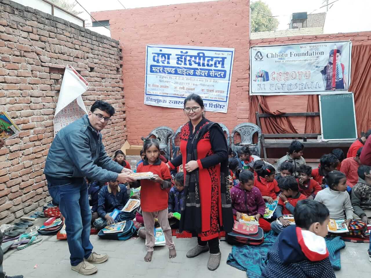 Chotu Foundation stationary distribution - Dr. Vivek Agrawal Firozabad - Vansh Mother and Child Care Center Firozabad - Vansh Hospital